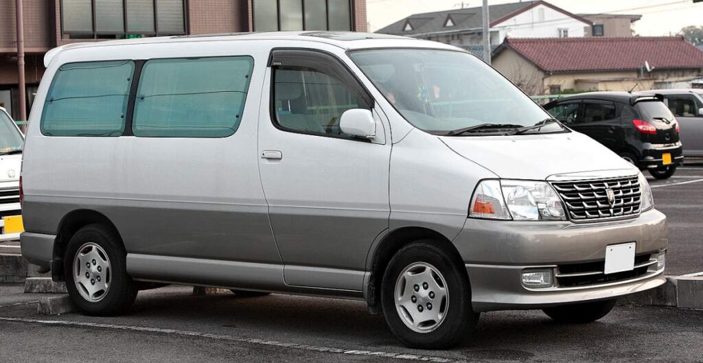 Toyota Hiace Grand Cabin in spacious parking lot