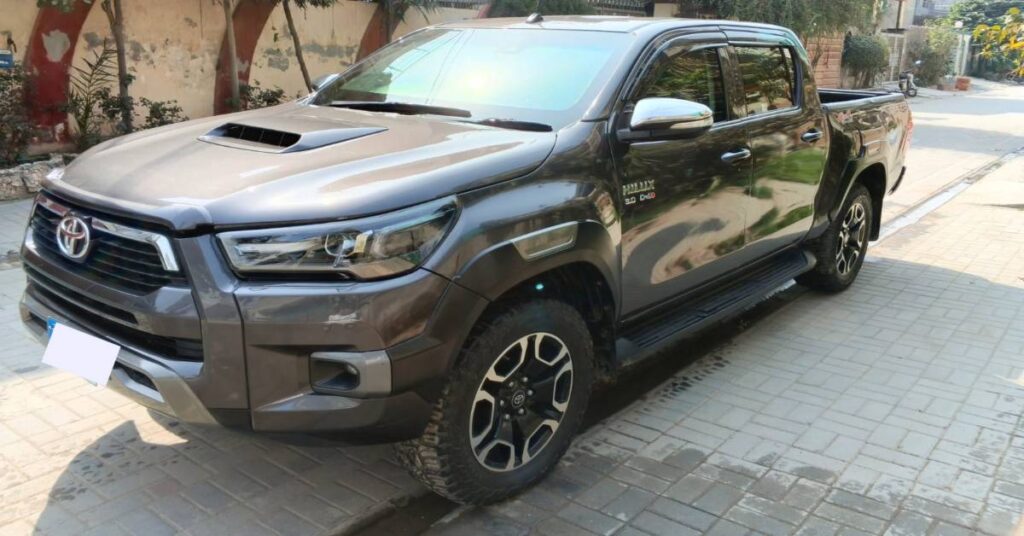 Toyota Hilux roadside, rugged in nature
