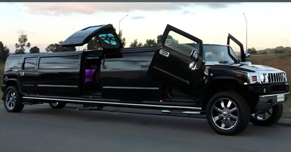 Black Hummer H2 limo, open doors, luxury interior